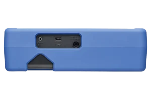 Electrician using HIOKI RM3548-50 to test EV battery busbar connections in automotive workshop